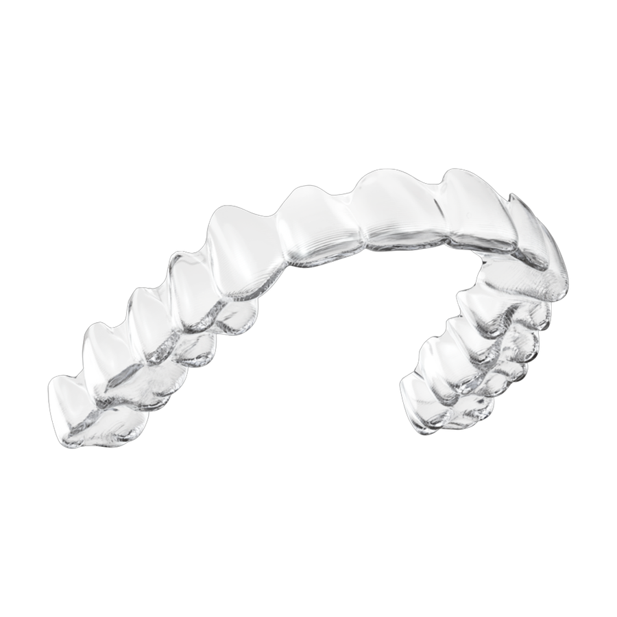 A clear removable aligner tray used in early orthodontic treatment